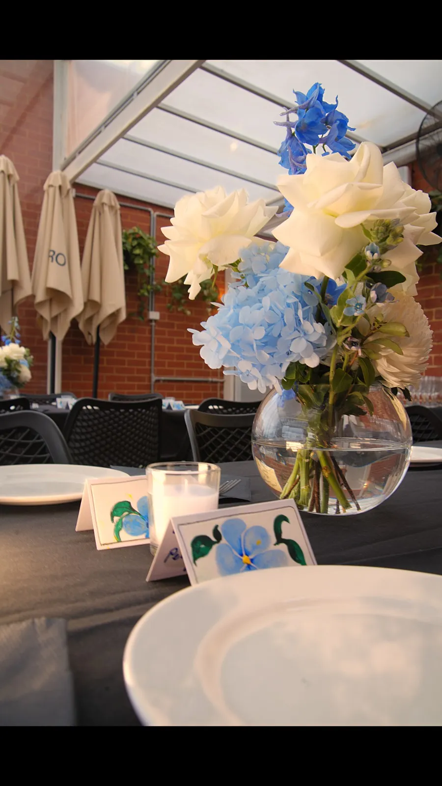 Floral table centrepiece at an Olive Lane private event