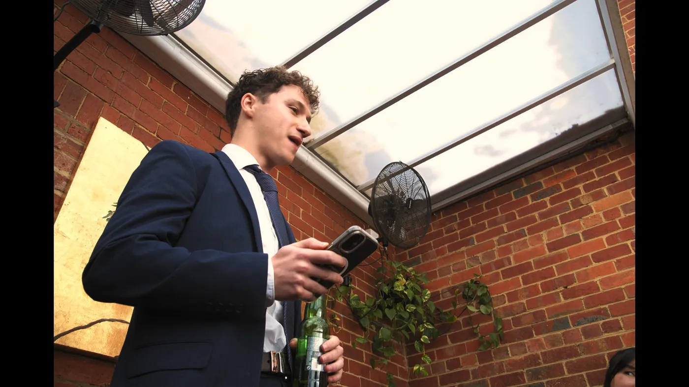 Guest giving a speech at an Olive Lane private event
