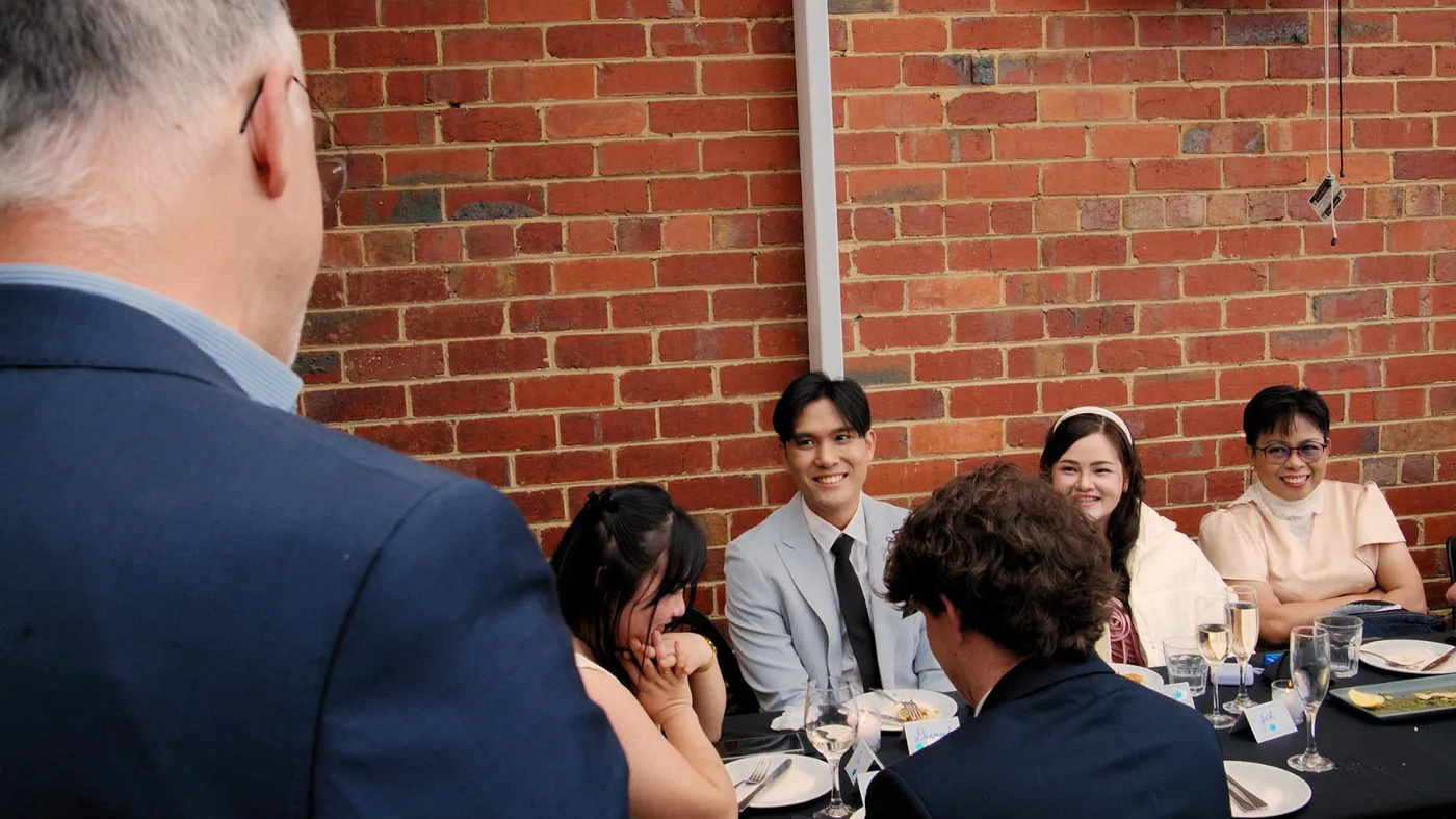 Guests and a young couple at an Olive Lane private event