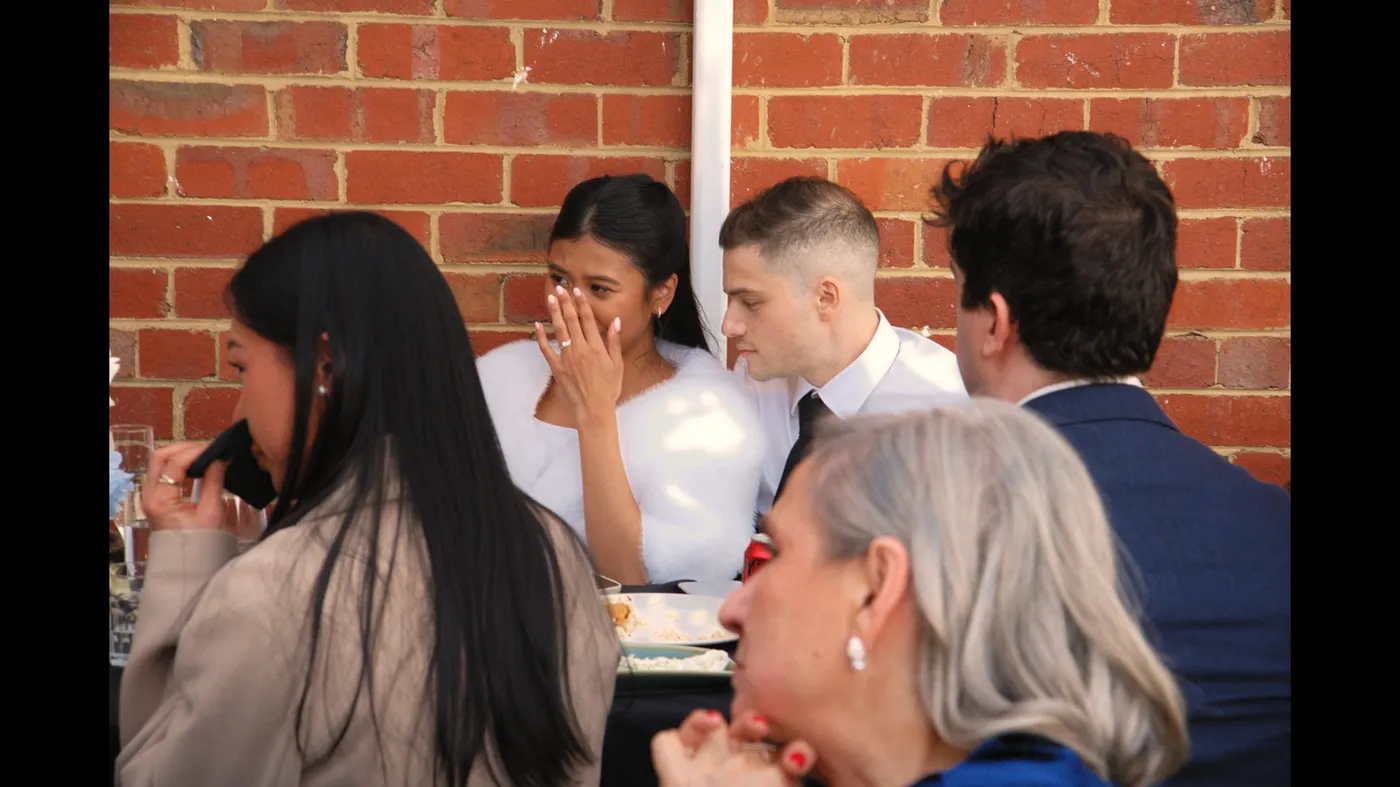 Guests laughing together at an Olive Lane celebration